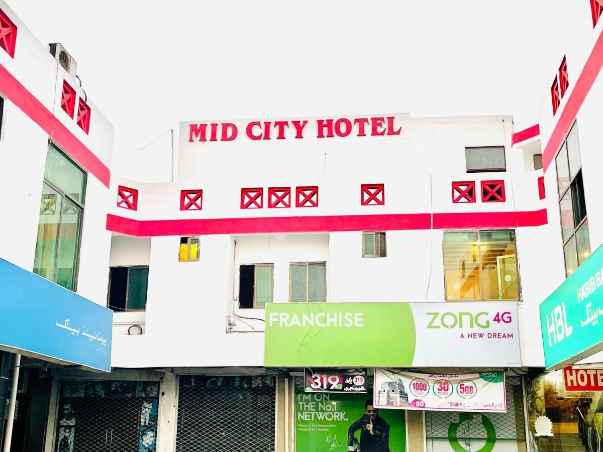 Hotel New Mid City Мултан Екстериор снимка