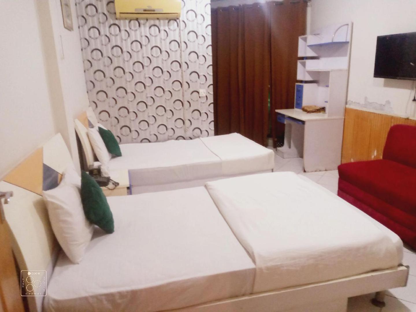 Hotel New Mid City Мултан Екстериор снимка