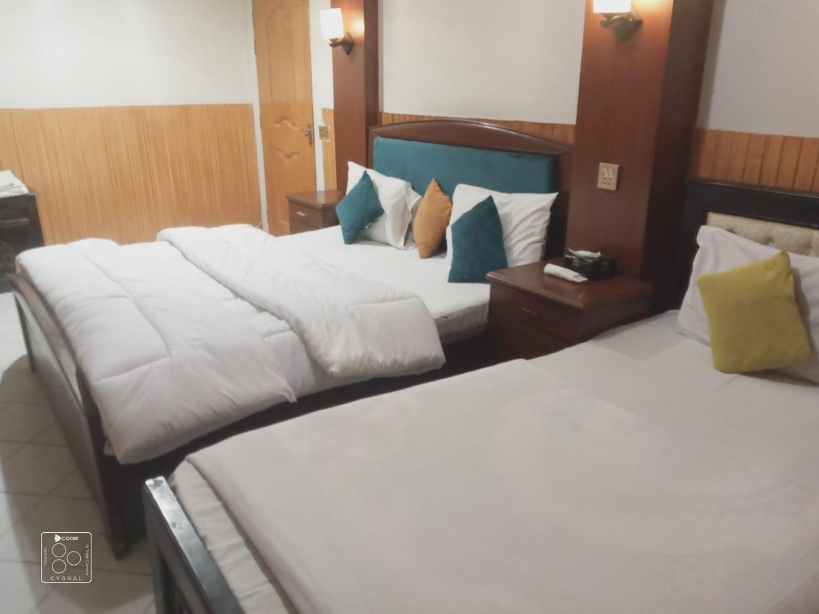 Hotel New Mid City Мултан Екстериор снимка